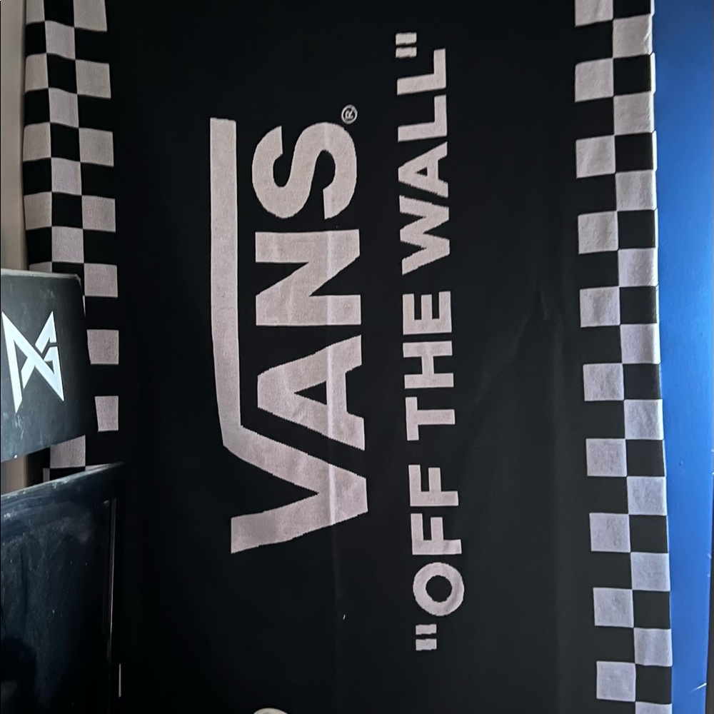 New in package Vans checkered blanket.